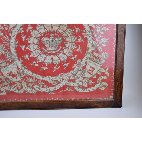 335 - A framed commemorative cloth celebrating Queen Victoria's Golden Jubilee. Victoria crown to centre w... 