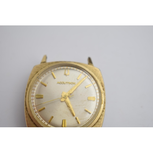 382 - Bulova Accutron gentleman's electric wristwatch. Gold tone outer case. Silvertone face, applied bato... 