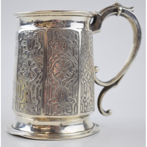 414 - Victorian hallmarked silver tankard with engraved decoration, 9.5cm tall, 124.0 grams.