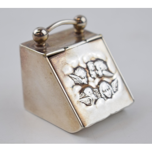 415 - Silver miniature coal scuttle with Reynold's Angels decoration, 35mm wide, hallmarks rubbed.