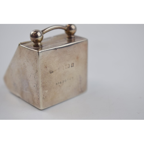 415 - Silver miniature coal scuttle with Reynold's Angels decoration, 35mm wide, hallmarks rubbed.