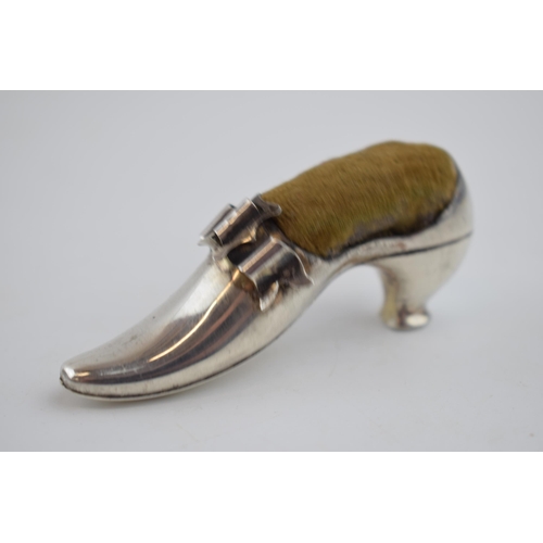 419 - Hallmarked silver pin cushion in the form of a shoe with an ornate buckle, Birmingham, late 19th cen... 