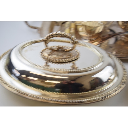 425 - Silver plate to include a pair of entree dishes, a 4 piece teaset, a large tray and others.