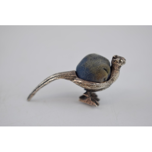 426 - Early 20th century sterling silver pin cushion in the form of a pheasant with blue velvet cushion, 4... 