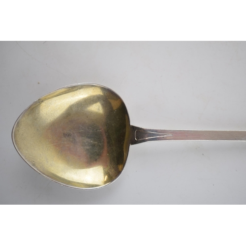 440 - Silver Arts and Crafts spoon, Kate Harris for William Hutton, London 1924, 63.0 grams, 20cm long.