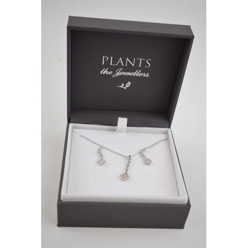 457 - 9ct white gold jewellery set to include a pair of earrings with a pendant and chain, all diamond set... 