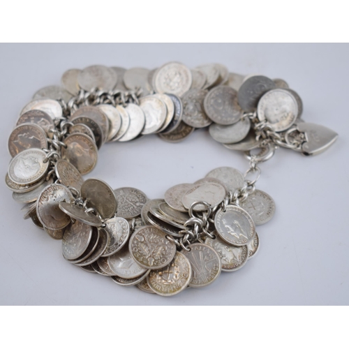 459 - Sterling silver bracelet with many silver three pence pieces to include pre-1946 and pre-1920 exampl... 