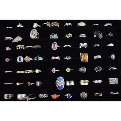 472 - A large collection of silver rings to include varying styles, sizes, gemstones and periods, (60 silv... 