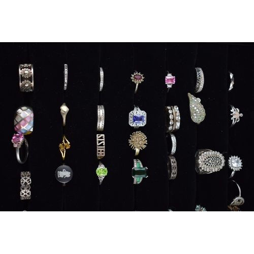 472 - A large collection of silver rings to include varying styles, sizes, gemstones and periods, (60 silv... 