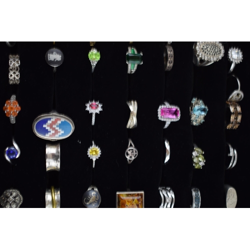 472 - A large collection of silver rings to include varying styles, sizes, gemstones and periods, (60 silv... 