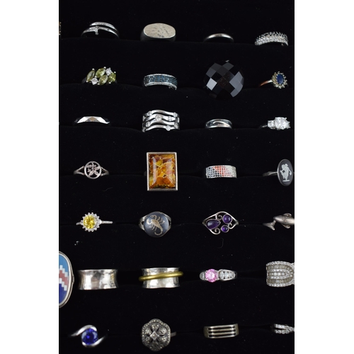 472 - A large collection of silver rings to include varying styles, sizes, gemstones and periods, (60 silv... 