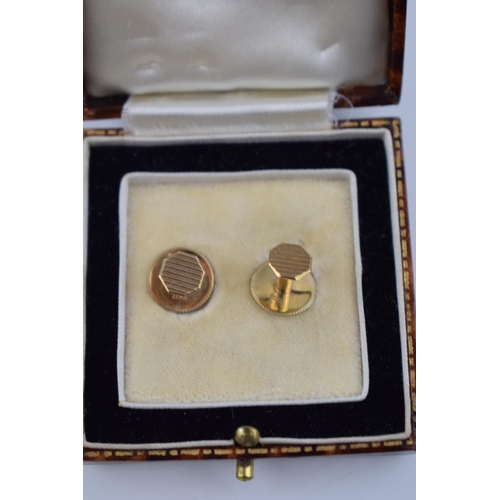 484 - A cased pair of 9ct gold studs, H Pidducks of Hanley, 1.8 grams, together with a set of 18ct gold mo... 