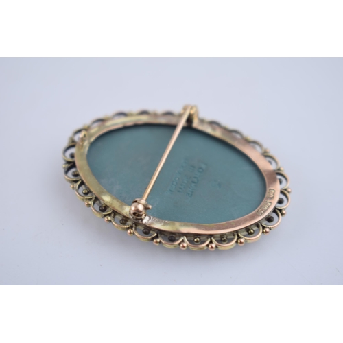 58K - 9ct gold brooch with Wedgwood teal Jasperware insert, 9.9 grams, 4.4cm tall.