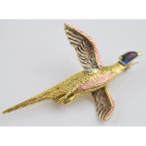 490 - 9ct gold brooch in the form of a flying pheasant, with enamelled decoration, varying tones of gold, ... 