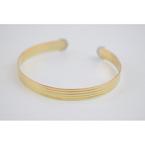 513 - Vintage 18ct gold Cartier trilogy cuff bangle, with original marks and import hallmarks for 1990, 13... 