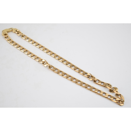 528 - 9ct gold curb link necklace / chain, 50.5cm long, 65.0 grams.