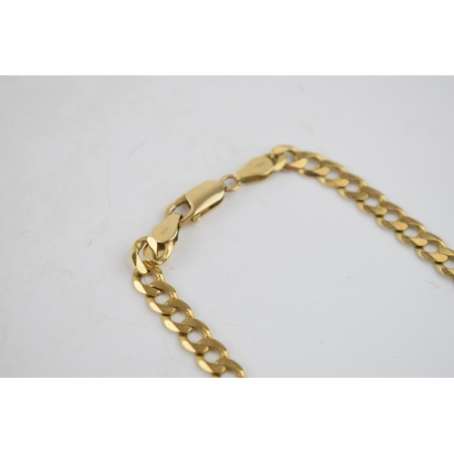 532 - 9ct gold curb link chain, 55cm long, 24.7 grams.