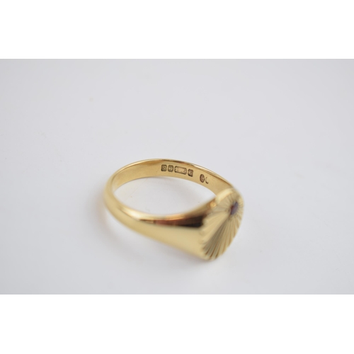 533 - 9ct gold gents ring set with garnet, size X, 6.7 grams.