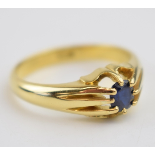 538 - 18ct gold gents ring set with ornately-set sapphire, 7.8 grams, size W.