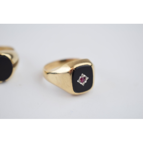 543 - 9ct gold gents ring, one set with onyx, size Z+2, with another set with a ruby amongst bright cut de... 