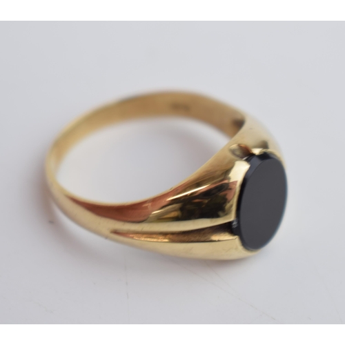 543 - 9ct gold gents ring, one set with onyx, size Z+2, with another set with a ruby amongst bright cut de... 