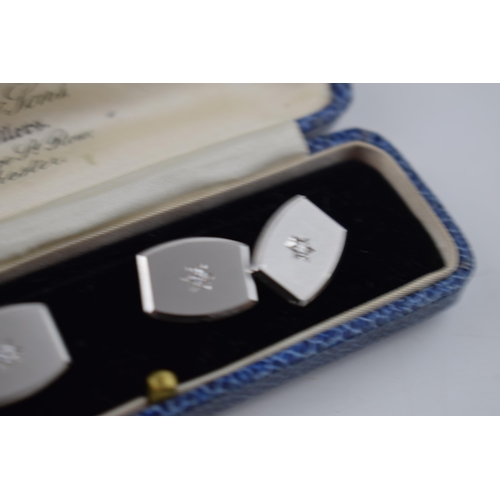 581 - 14ct white gold diamond set cufflinks, 4 x diamonds, each about 4 points.  Stamped .585.  Weight 12.... 