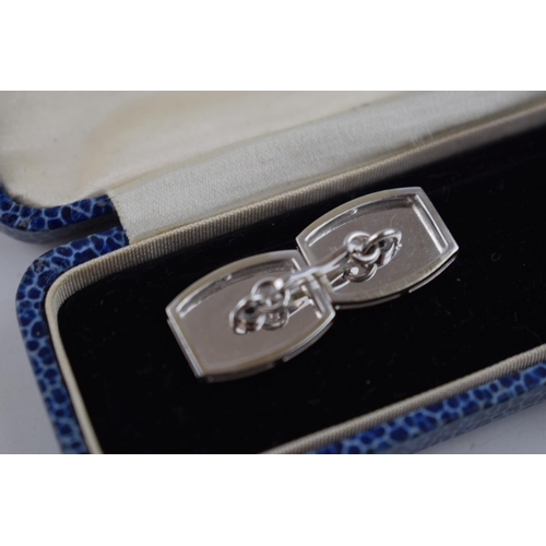 581 - 14ct white gold diamond set cufflinks, 4 x diamonds, each about 4 points.  Stamped .585.  Weight 12.... 