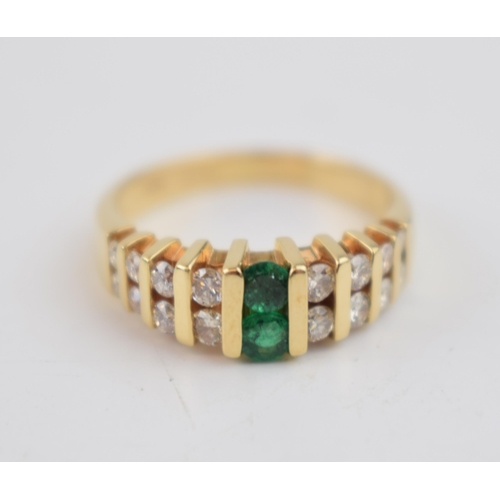 586 - Diamond & emerald set dress ring, set in 14ct gold with 16 diamonds and two emeralds, size M, weight... 