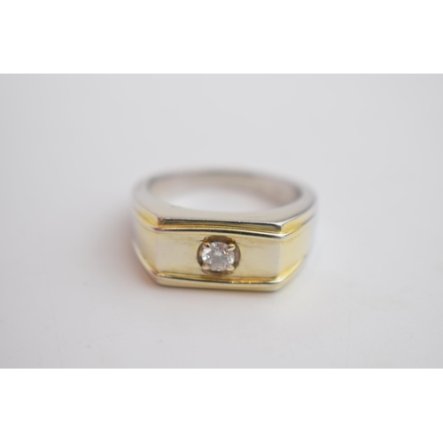 594 - 9ct white gold single stone set diamond ring, with yellow gold accenting.  Stone measures 20/ 25 poi... 