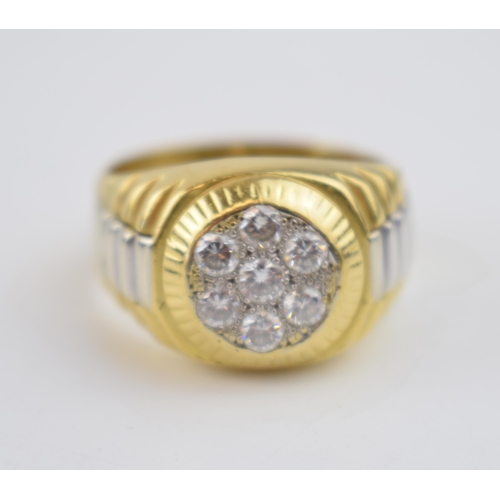 596 - 18ct gold and 7 diamond cluster ring, 1.4ch appx.  Diamonds measure around 20 points each approx, in... 