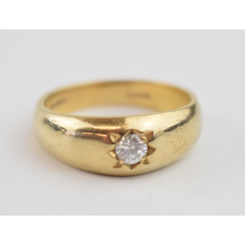 598 - 9ct gold hallmarked single diamond gypsy set ring, diamond measures 0.20 ct approx.  Weight 5.8g, ri... 