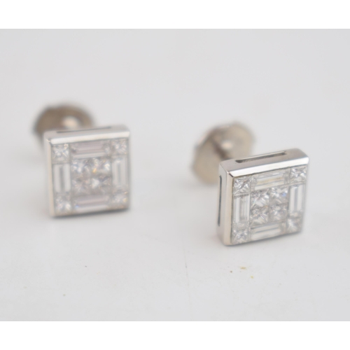 603 - Diamond and 18ct white gold hallmarked designer high quality earrings containing a total of 8 small ... 