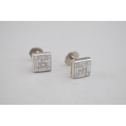 603 - Diamond and 18ct white gold hallmarked designer high quality earrings containing a total of 8 small ... 