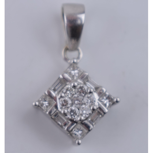 604 - 14ct white gold pendant set 15 diamonds – 7 x round, 4 x square & 4 x baguette.  Face measures 9mm x... 