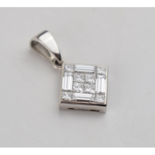 605 - 18ct white gold pendant set 12 diamonds –8 x square & 4 x baguette.  Face measures 9mm x 9mm.  Hallm... 