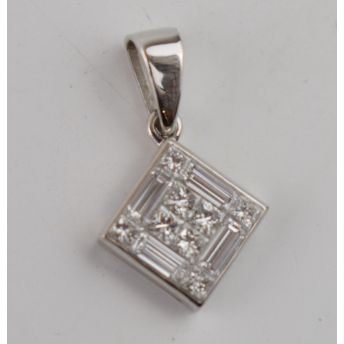 605 - 18ct white gold pendant set 12 diamonds –8 x square & 4 x baguette.  Face measures 9mm x 9mm.  Hallm... 