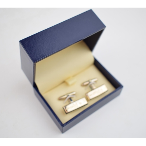 606 - The Royal Mint boxed hallmarked silver ingot cufflinks, 15g, limited edition of 250.