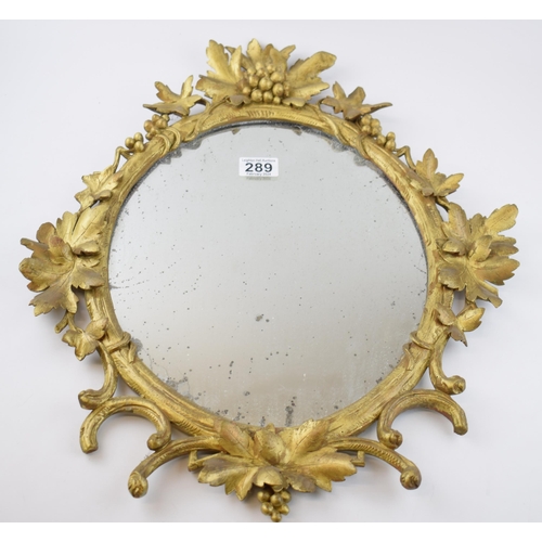 289 - Victorian or earlier carved wooden wall hanging mirror with grape and vine decoration, gilt finish, ... 