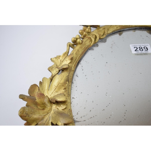 289 - Victorian or earlier carved wooden wall hanging mirror with grape and vine decoration, gilt finish, ... 