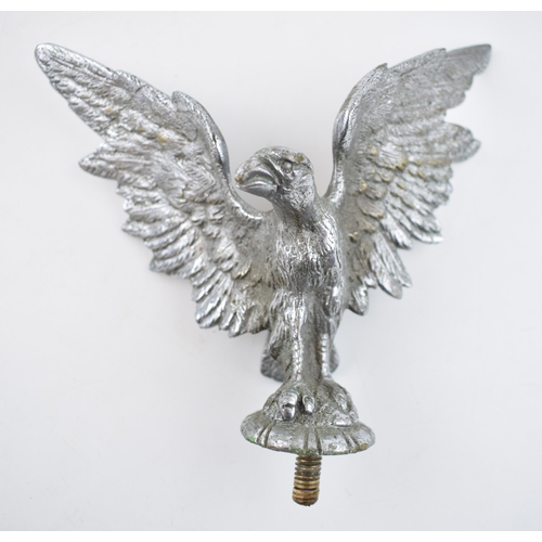 237A - A chrome plated car mascot in the form of an eagle with spread wings, 16cm wide.