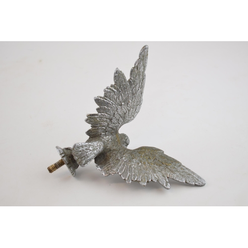 237A - A chrome plated car mascot in the form of an eagle with spread wings, 16cm wide.