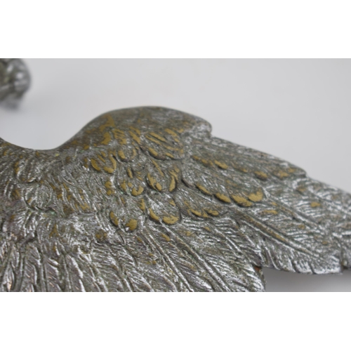 237A - A chrome plated car mascot in the form of an eagle with spread wings, 16cm wide.