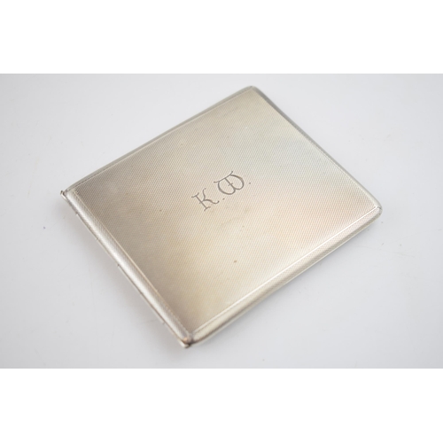 560 - Silver cigarette case, Birmingham 1957, 123.4 grams.