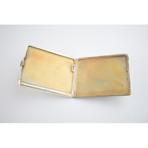 560 - Silver cigarette case, Birmingham 1957, 123.4 grams.