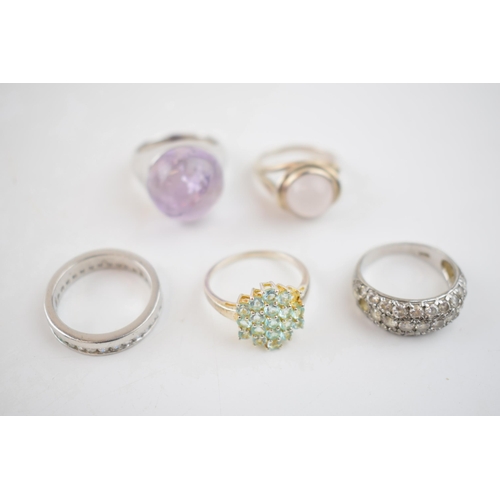 576 - A collection of silver dress rings with gemstones, 25.4 grams (5).