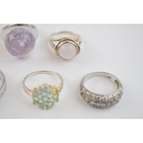 576 - A collection of silver dress rings with gemstones, 25.4 grams (5).