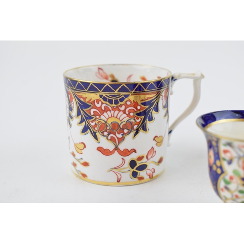 100 - An early 19th century Derby porcelain coffee can and similar style cup and footed vase, c.1810-30. V... 