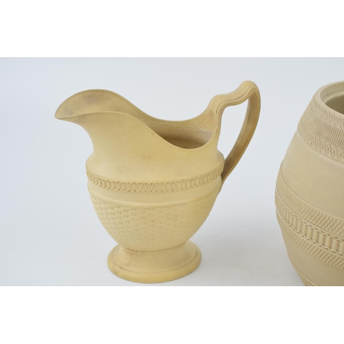 106 - A pair of late 18th century / early 19th century cane ware pottery items, probably by Wedgwood, to i... 