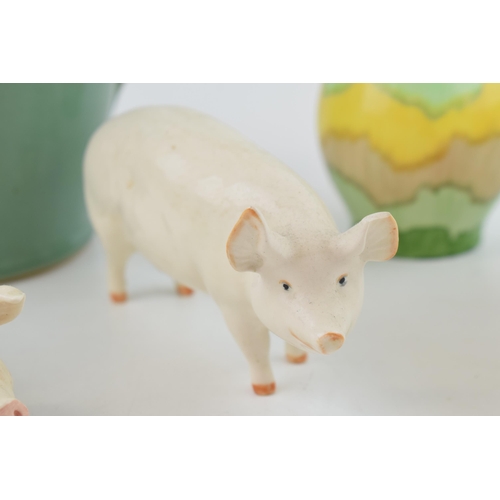 125 - A collection of Beswick pigs to include 'Wall Queen','Wall Champion Boy' and another example with a ... 