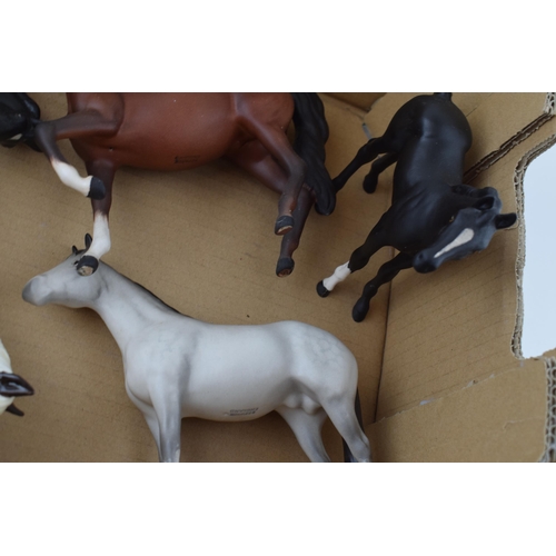 128 - Beswick horses to include a matte prancing arab, a grey matt thoroughbred, a pair of black matt foal... 